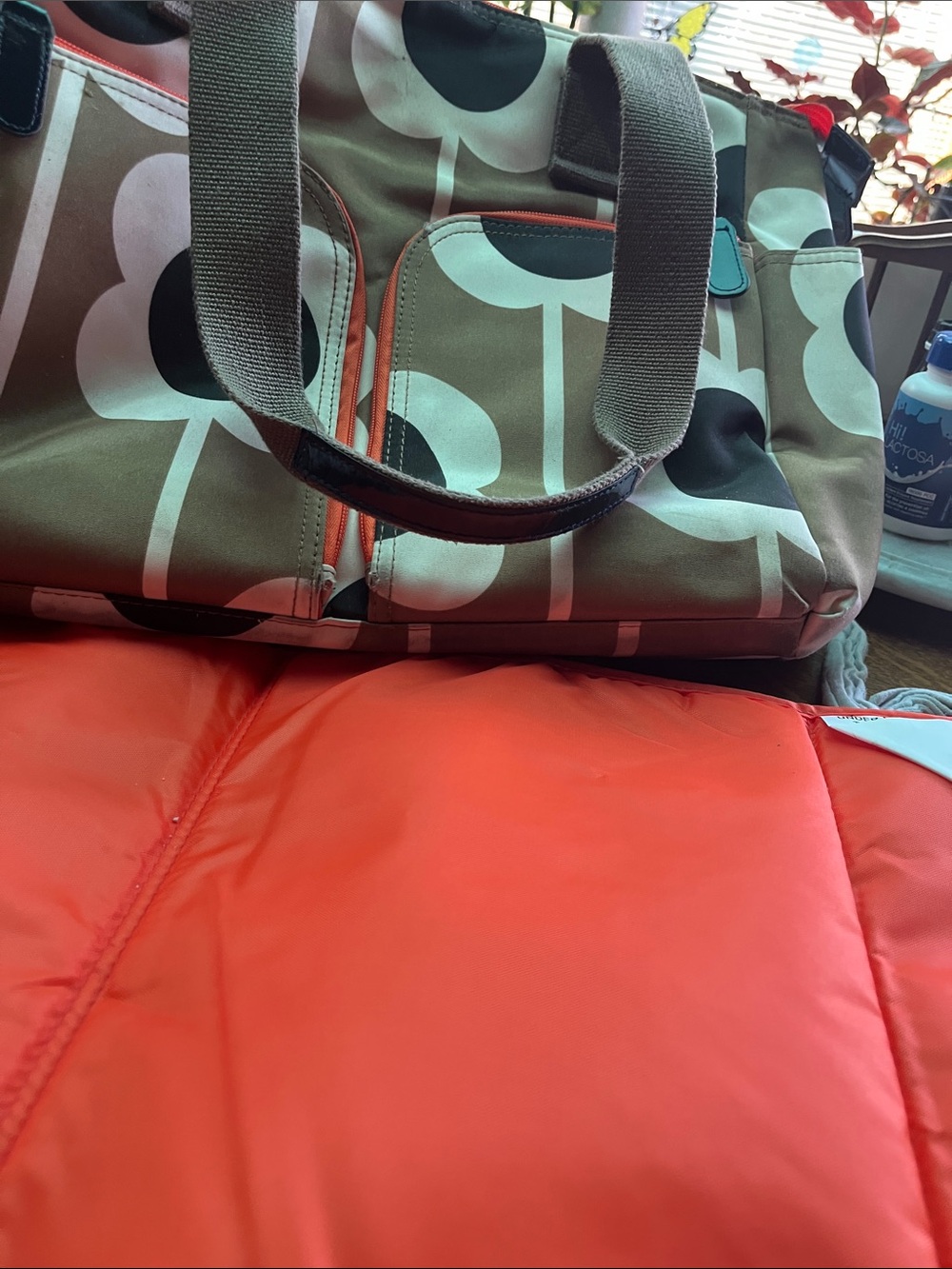 Brown, beige and orange diaper bag. Orla Kiely (Target).